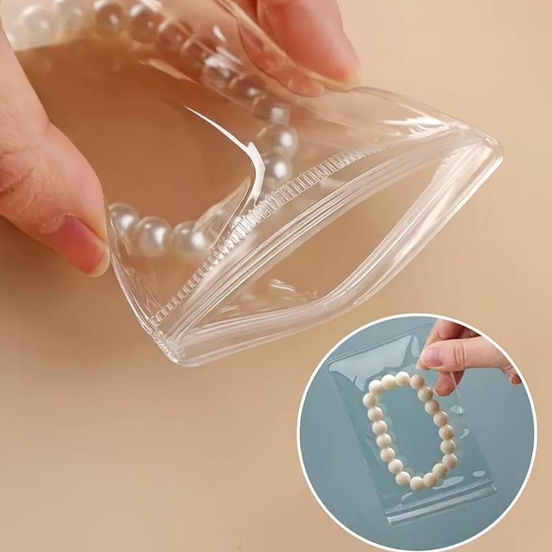 Premium Clear Antioxidant Jewelry Bags - 100 Pcs Self-Sealing Zipper Pouches for Durable and Convenient Storage - 2.75"x3.93" Anti-Aging Solution for Jewelry Preservation